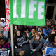 Hundreds of people sit in silent protest against the proposed Dakota Access Pipeline outside the offices of the Army Corps of Engineers on Nov. 15, 2016, in Washington, D.C.
Chip Somodevilla/Getty Images